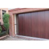 Porte de garage coulissante avec portillon et serrure